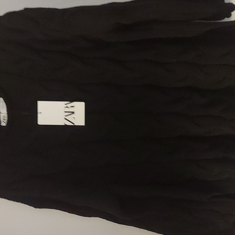Vented Cable Knit Sweater
